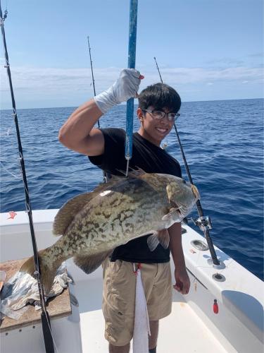 Angler with a king mackerel